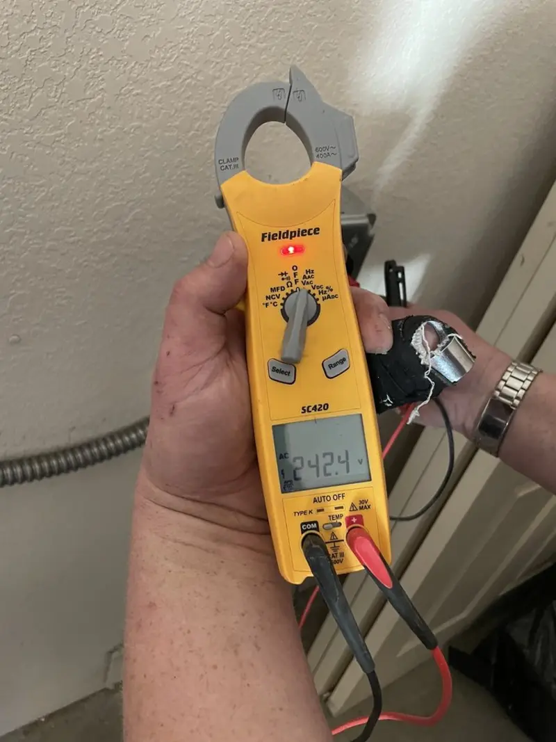 Voltage testing with clamp meter during Generator Installation in Woodlake
